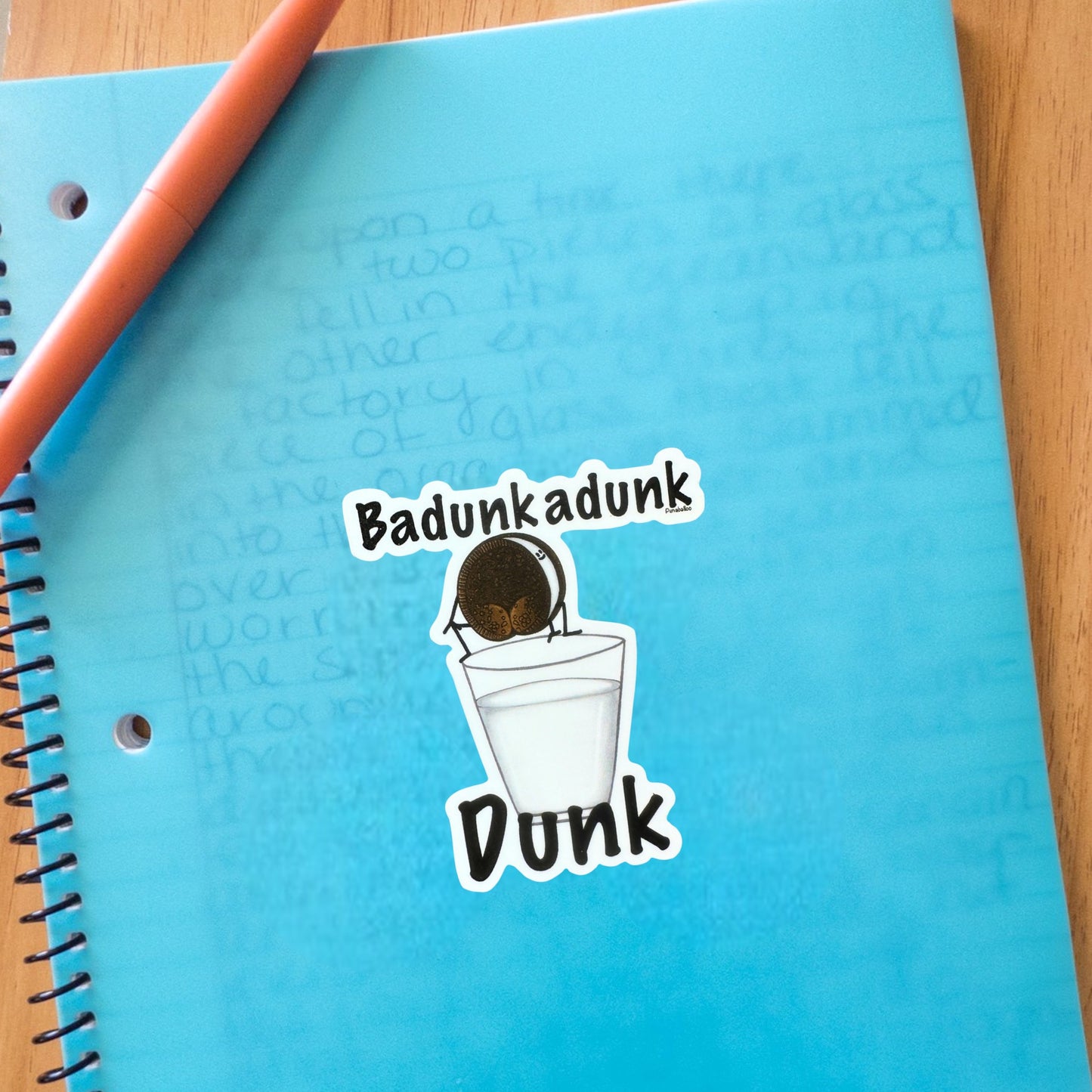Badunkadunk Dunk cookie sticker — hand-drawn milk & cookies food pun design by Punaballoo, waterproof vinyl decal for snack lovers and humor fans.