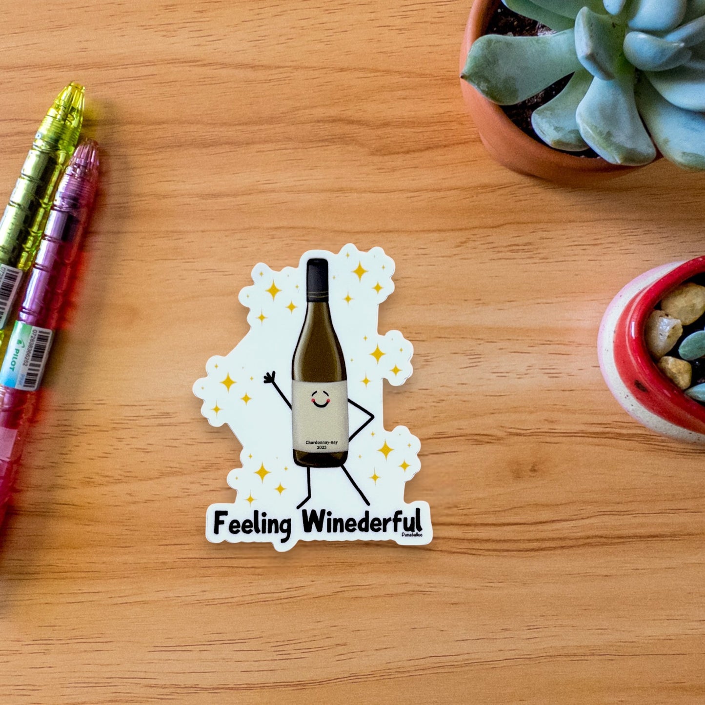 “Feeling Winederful” wine sticker — hand-drawn wine pun design by Punaballoo, waterproof vinyl decal for wine lovers and humor fans.
