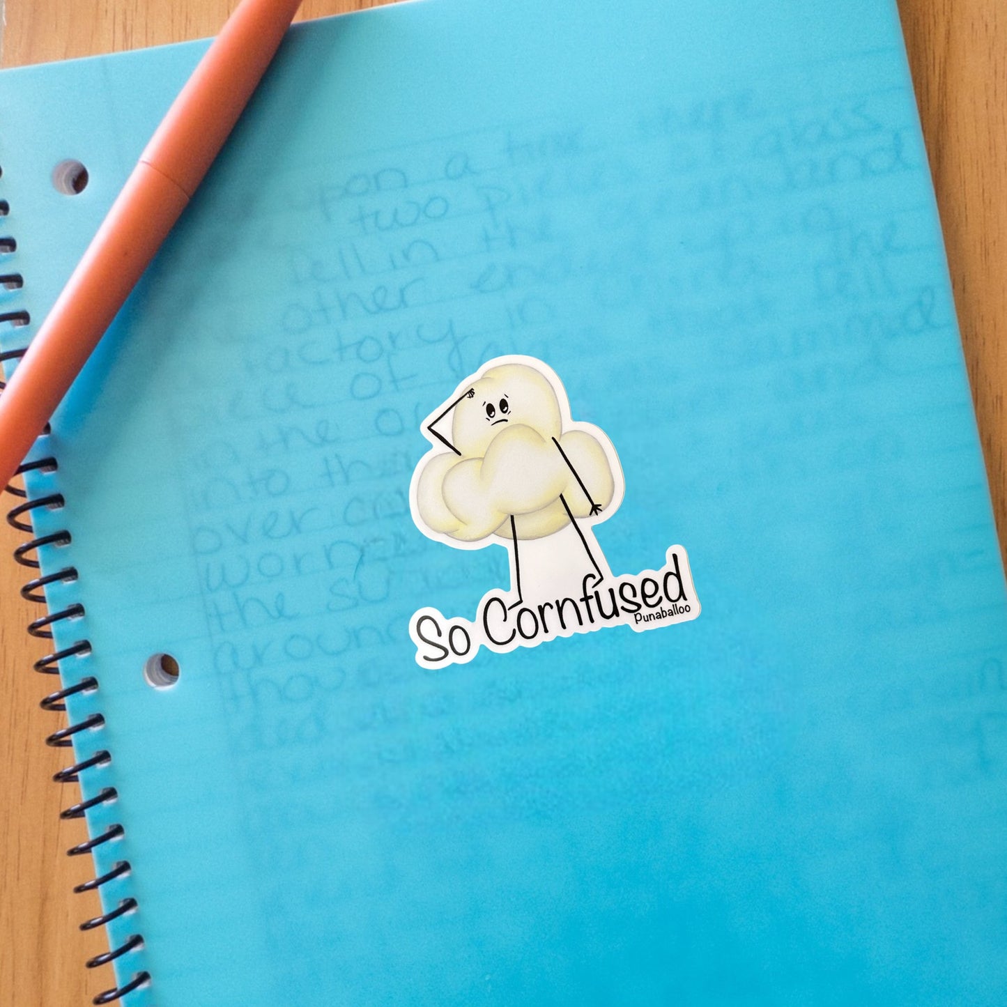 “So Cornfused” popcorn sticker: a funny, hand-drawn pun about brain fog and snack confusion. 🍿 Waterproof vinyl decal for forgetful pun lovers.