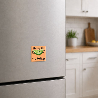 Lime pun refrigerator magnet on a stainless steel fridge in a bright kitchen