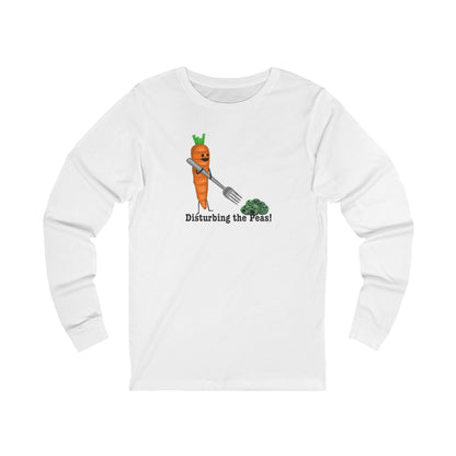 Front of white long sleeve shirt with a carrot holding a fork toward a pile of peas
