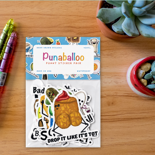 Punaballoo inappropriate pun sticker pack on a wooden desk
