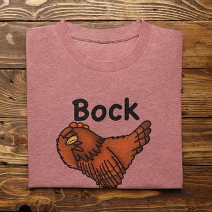 Folded heather mauve Bock My Life funny chicken t-shirt on rustic wood background