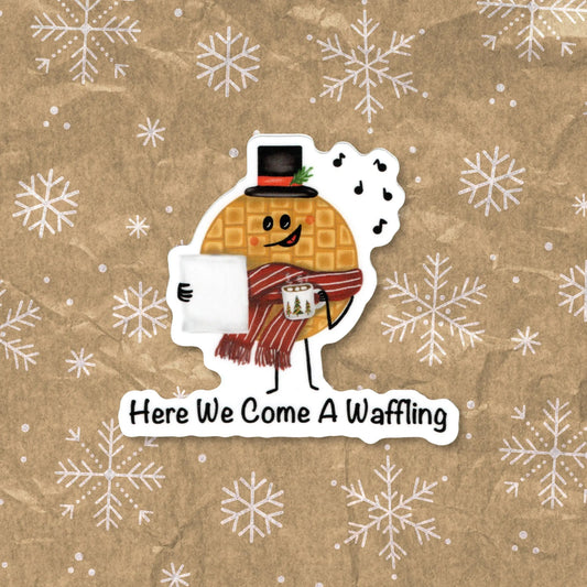 Here We Come A-Waffling sticker — hand-drawn Christmas waffle caroler pun design, waterproof vinyl decal.