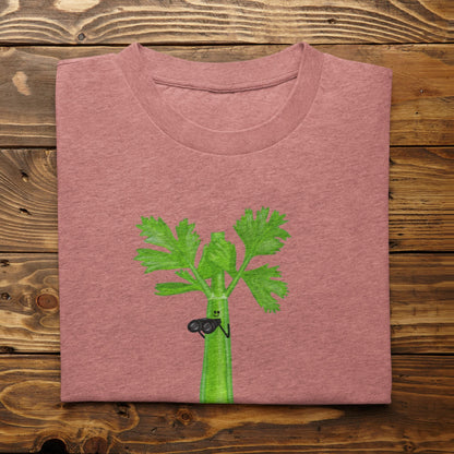 Heather mauve Stalker celery pun T-shirt flat lay featuring a green celery character holding binoculars.