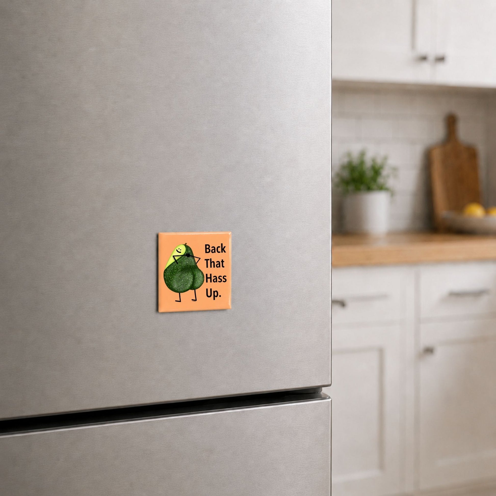 Back That Hass Up avocado pun magnet on a kitchen fridge
