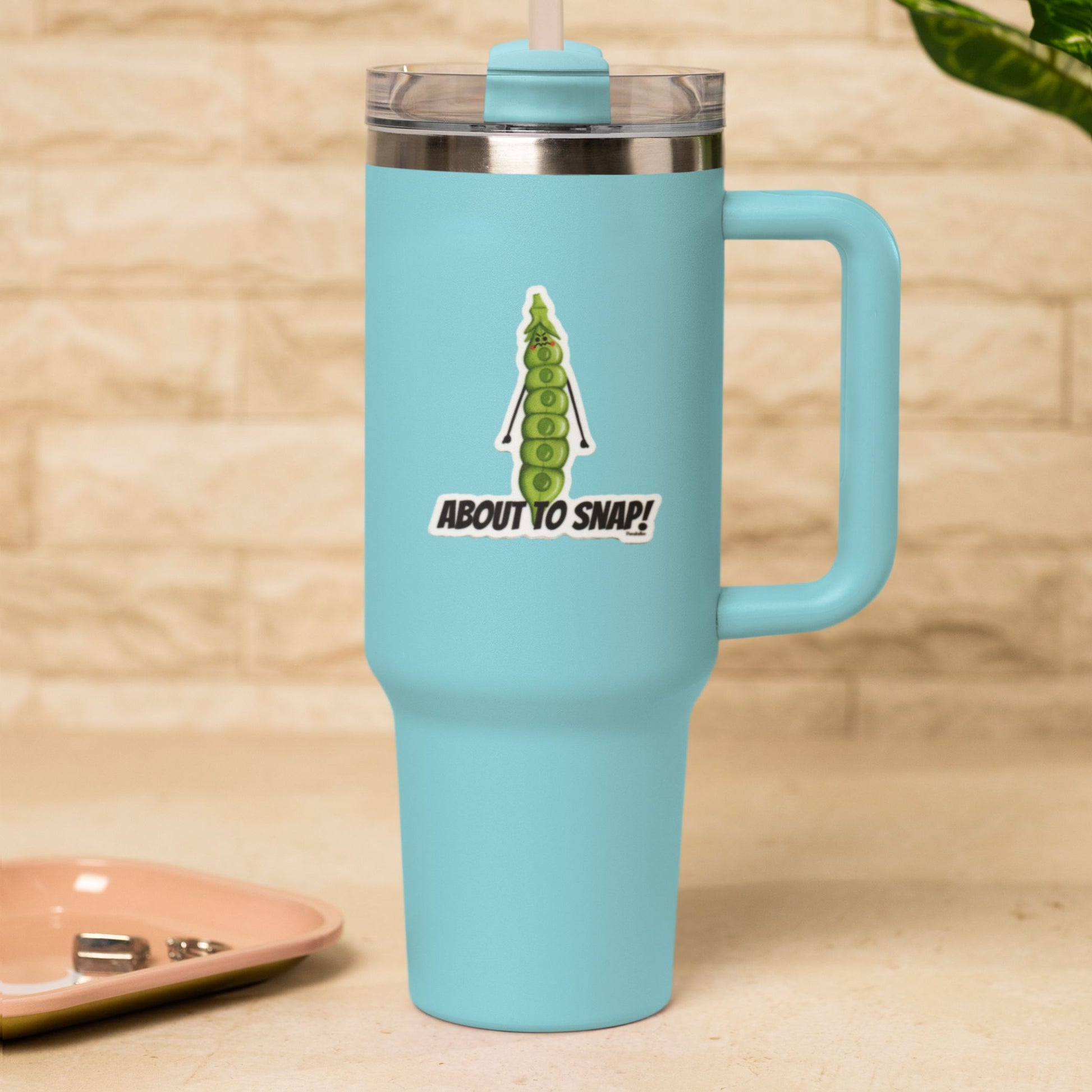 About to Snap funny vegetable sticker on a blue travel tumbler