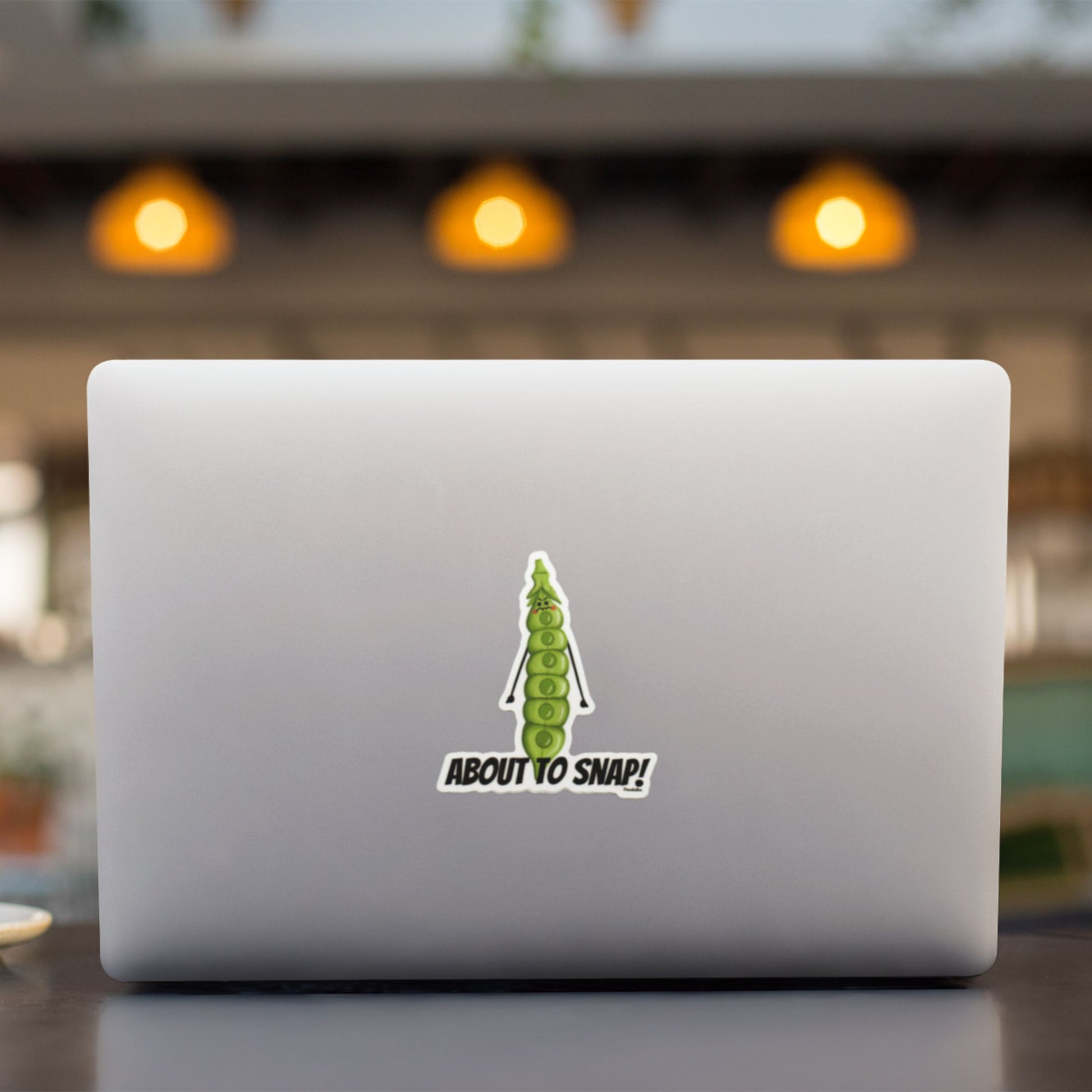 About to Snap funny vegetable sticker on a laptop