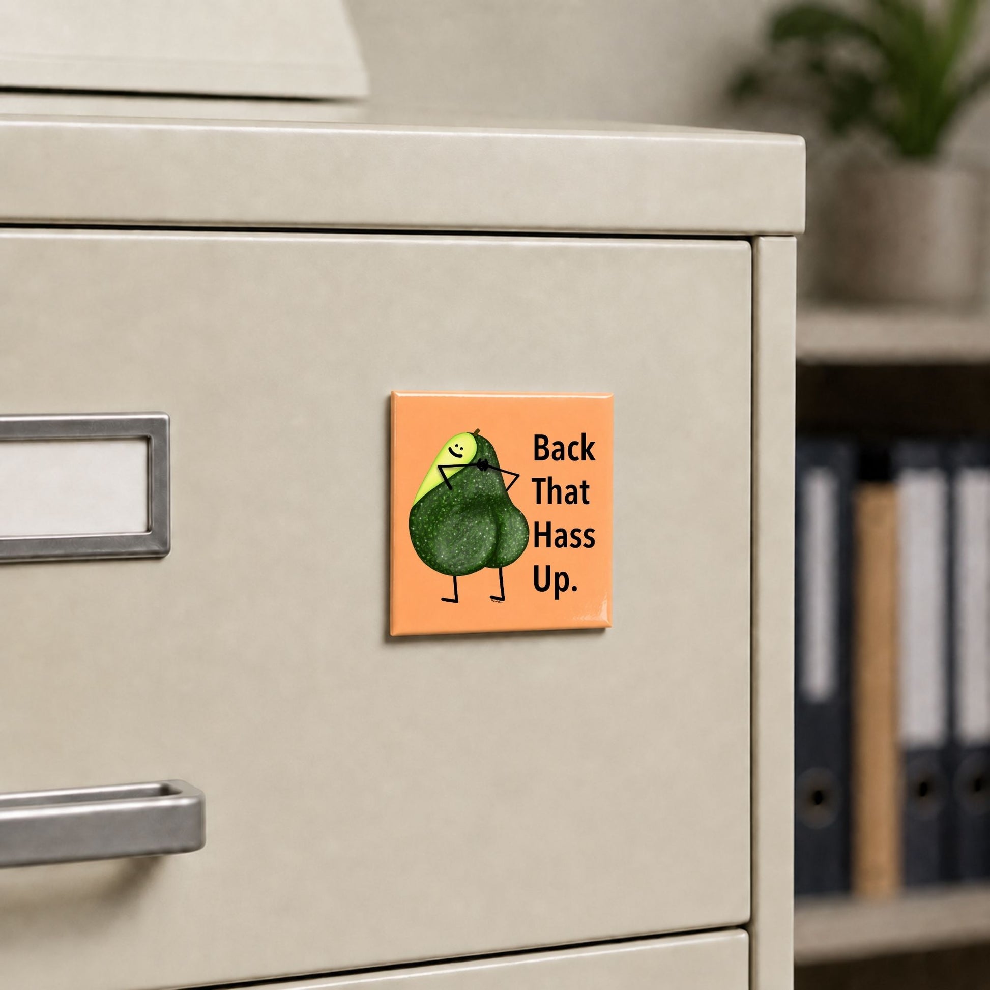 Back That Hass Up funny avocado magnet on a cream file cabinet