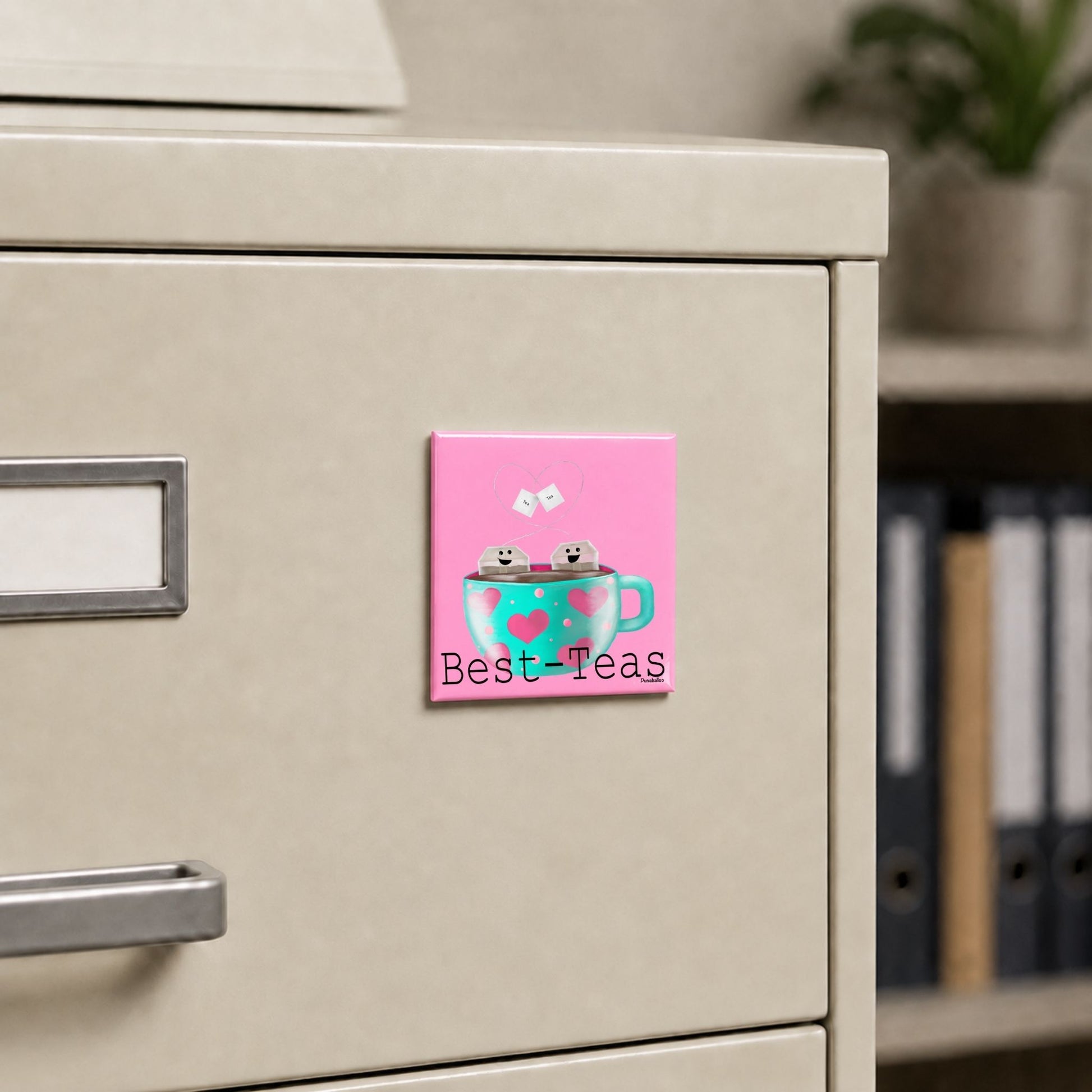 Best-Teas funny tea magnet on a cream file cabinet
