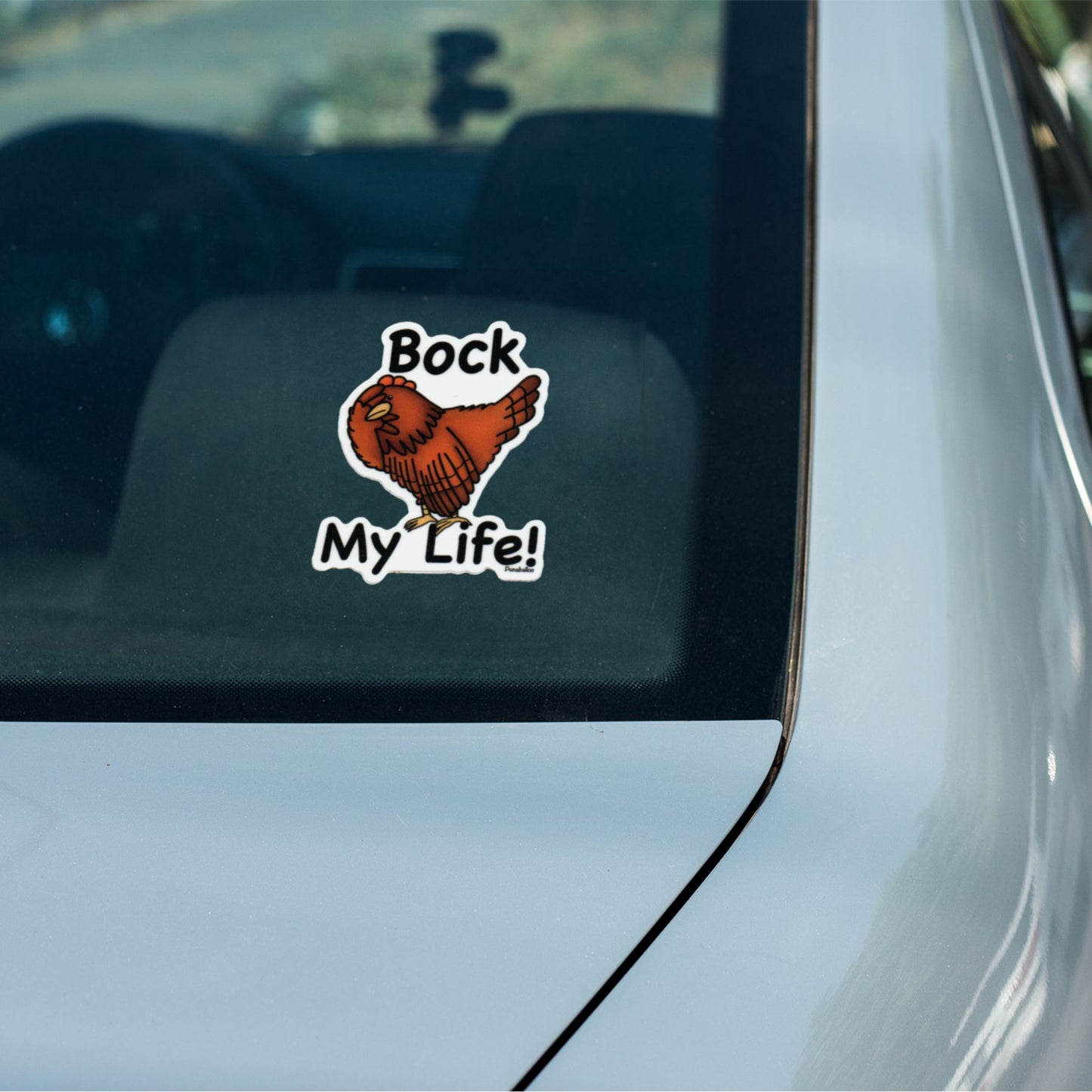 Bock My Life chicken sticker on a car window