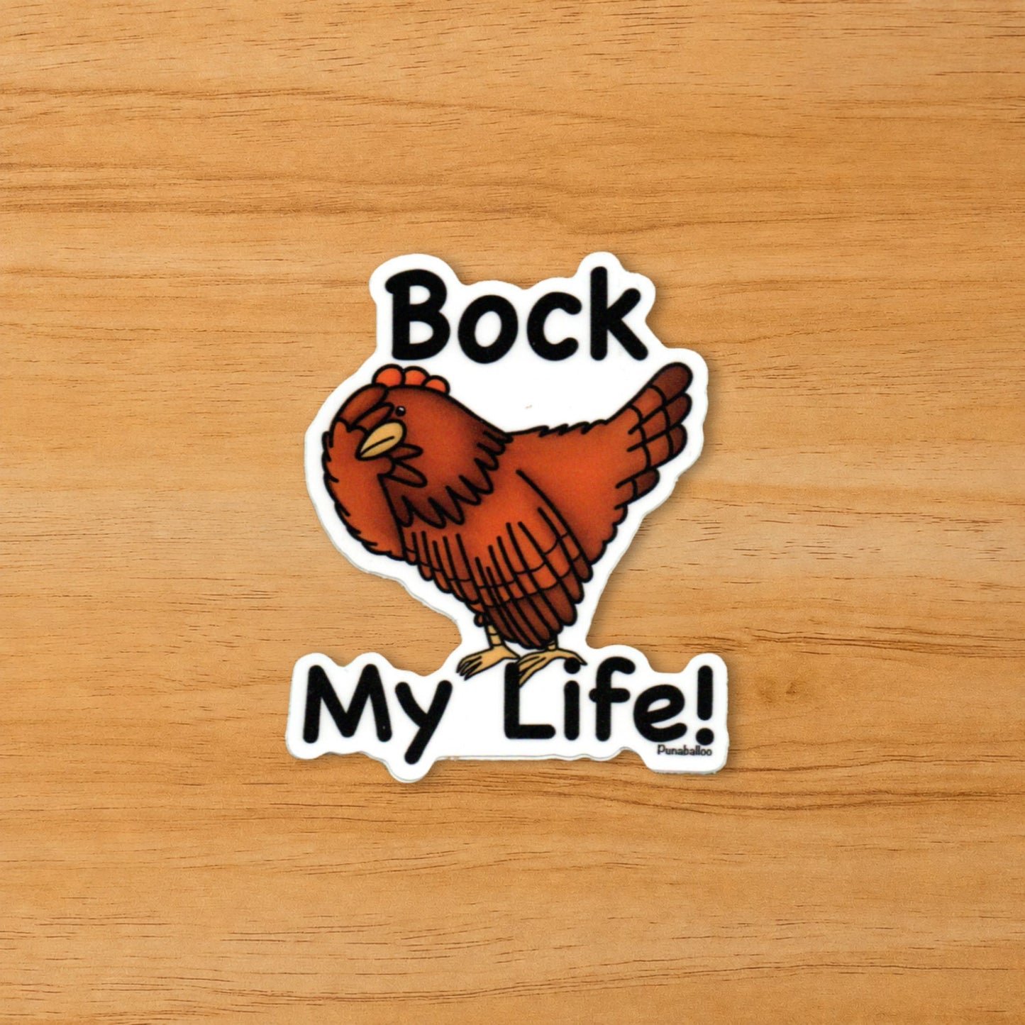 Bock My Life funny chicken sticker on a wood surface