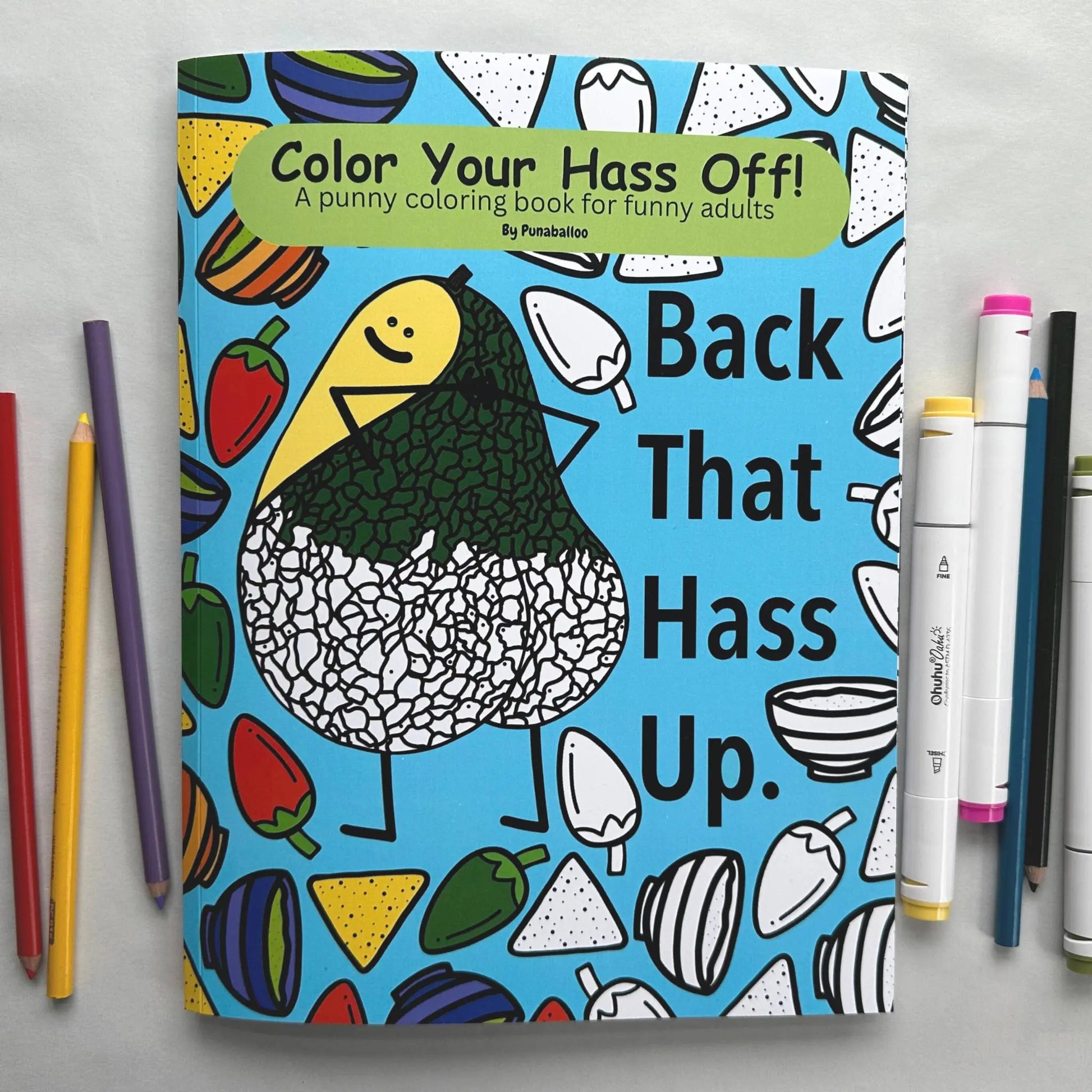 Color Your Hass Off adult coloring book for stress relief featuring funny food puns with markers and colored pencils