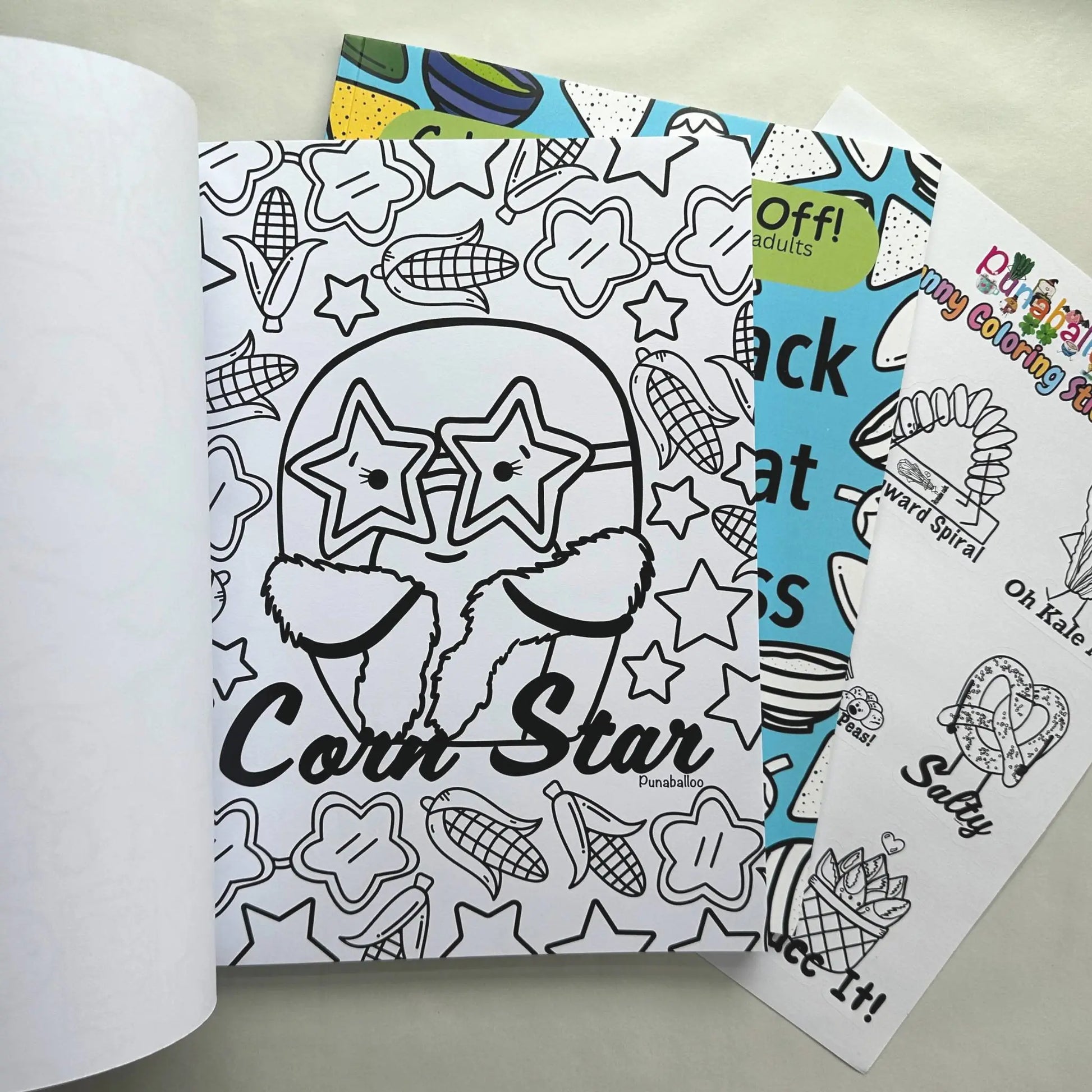 Corn Star food pun coloring page inside adult coloring book set with sticker sheet
