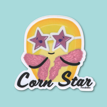 “Corn Star” corn sticker — hand-drawn food pun design by Punaballoo, waterproof vinyl decal for snack lovers and humor fans on a mint green background.