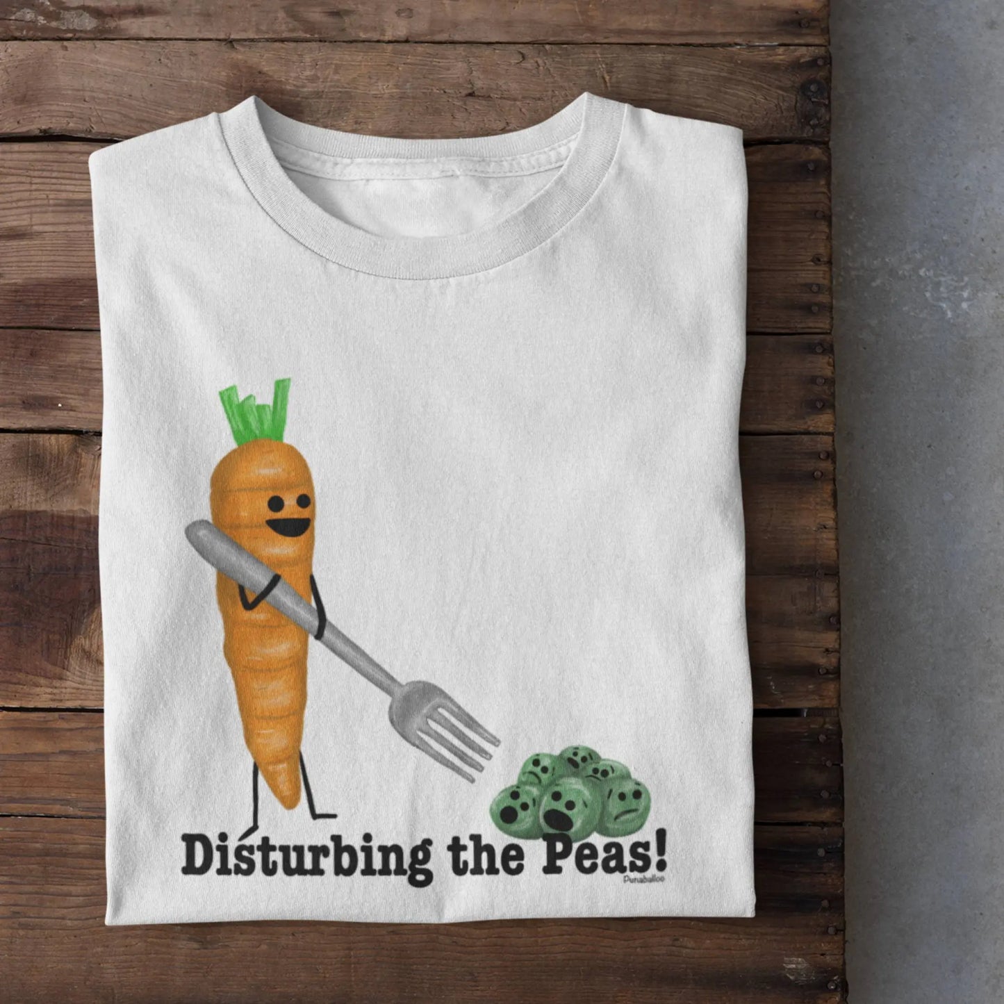 Disturbing the Peas vegetable pun shirt flat lay white