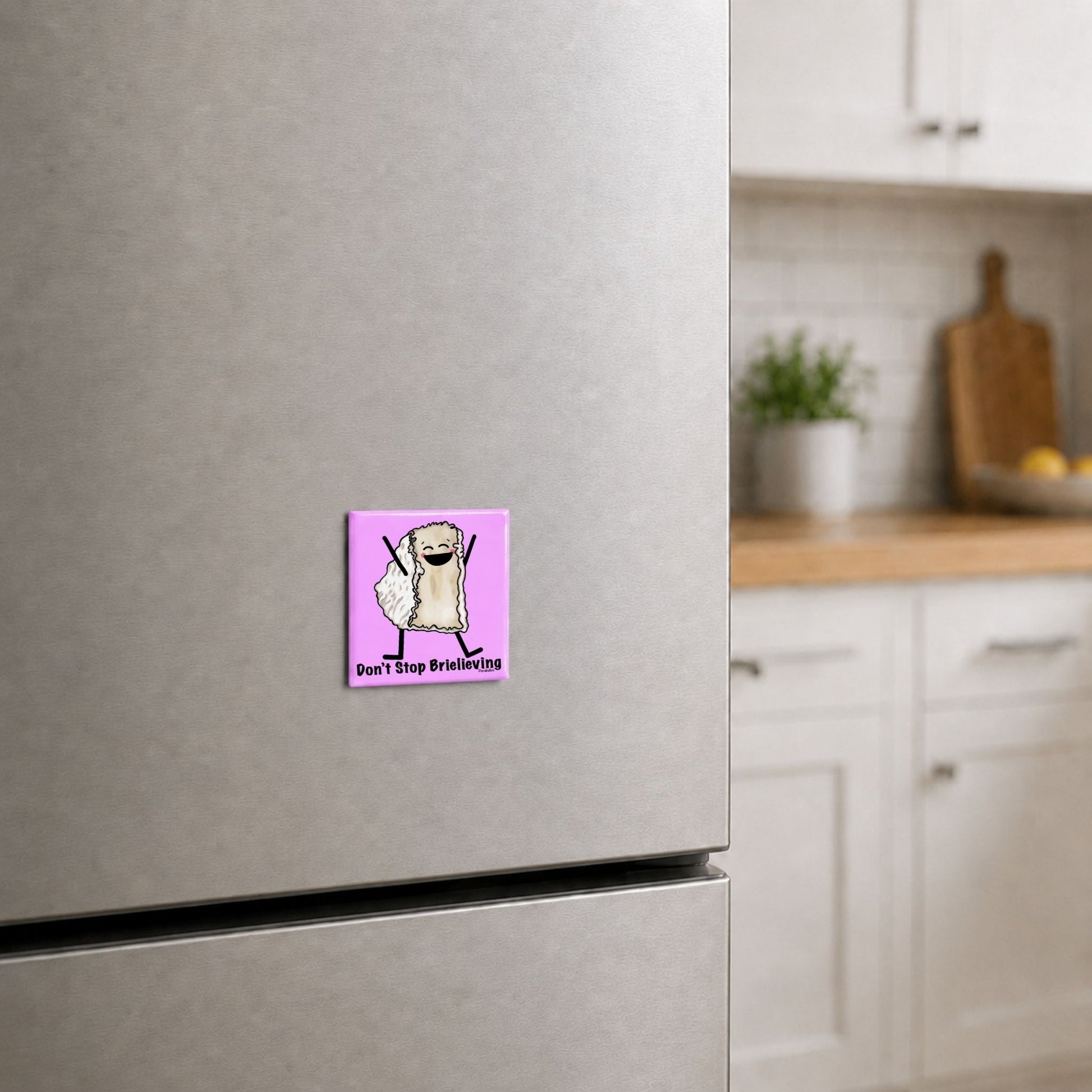 Don’t Stop Brielieving cheese pun magnet on a kitchen fridge