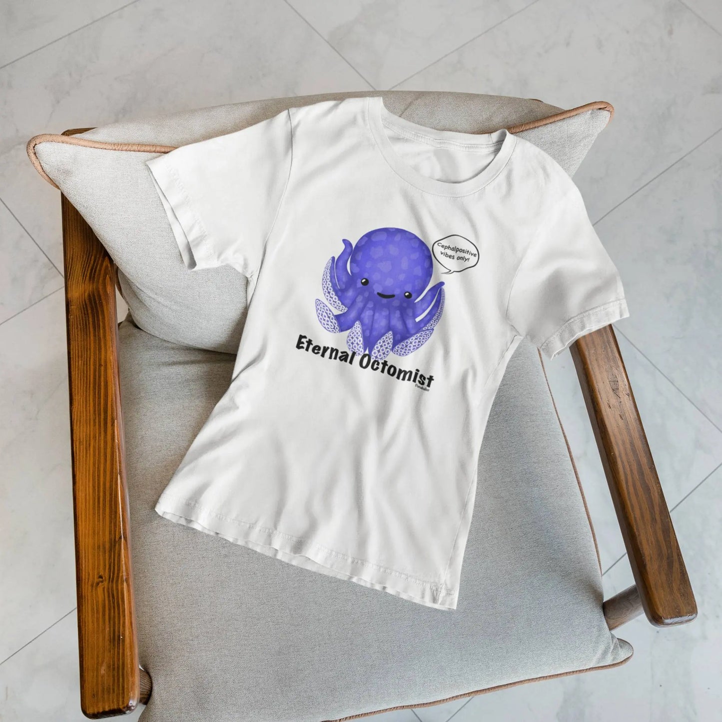 Eternal Octomist funny octopus pun t-shirt front view flat lay on chair