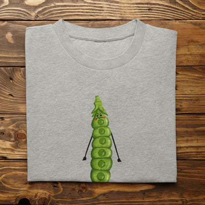 Folded athletic heather I’m About to Snap vegetable pun shirt on rustic wood background