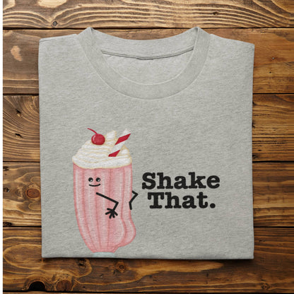 Folded athletic heather Shake That funny ice cream shirt on rustic wood background