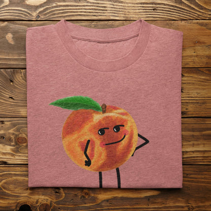 Folded heather mauve Karma Is a Peach peach pun t-shirt on rustic wood background