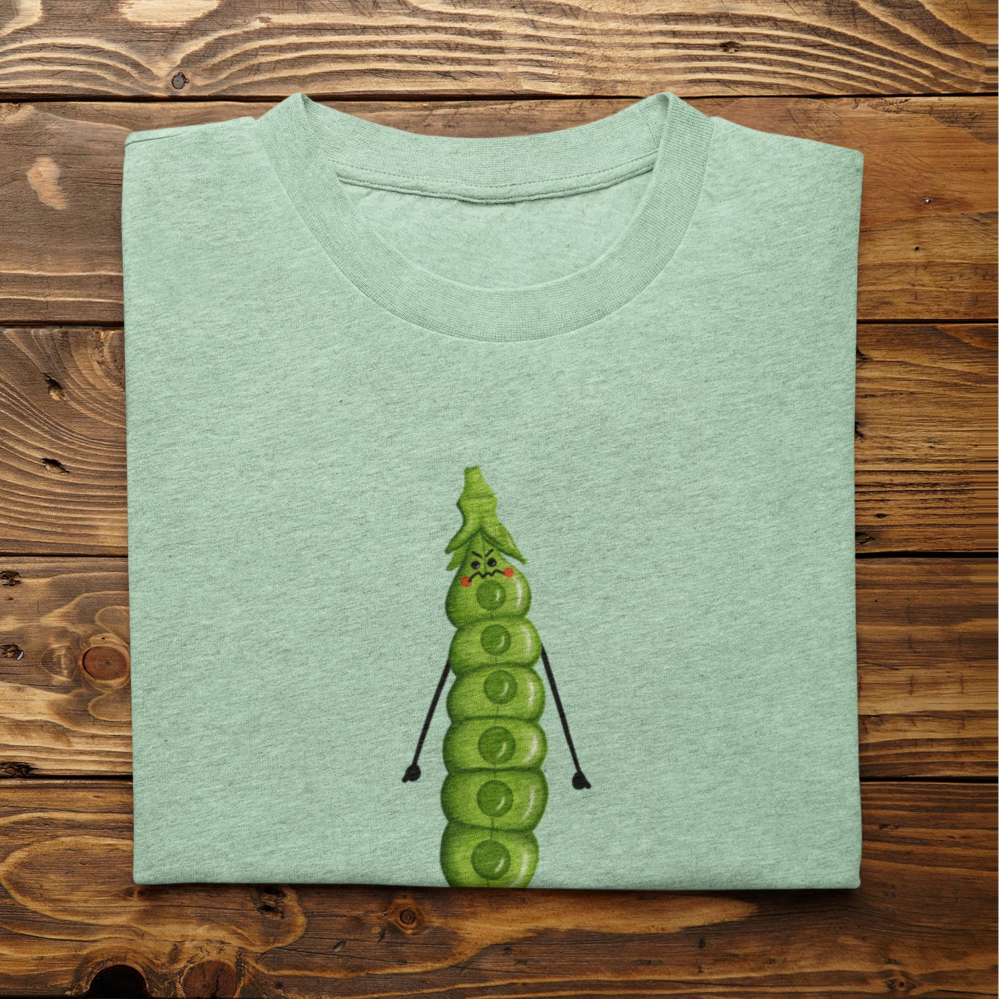 Folded heather mint I’m About to Snap funny plant t-shirt on rustic wood background