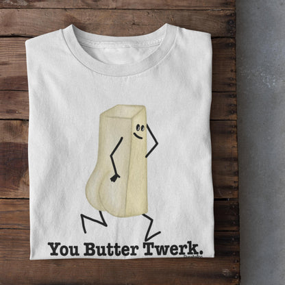  Folded white You Butter Twerk butter pun t-shirt on rustic wood background