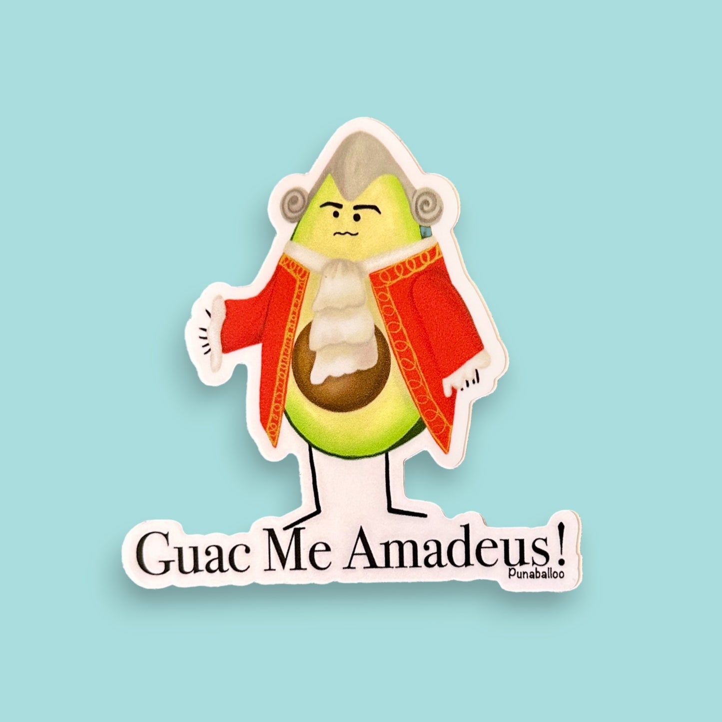 “Guac Me Amadeus” avocado sticker — hand-drawn New Wave food pun design by Punaballoo, waterproof vinyl decal for avocado and music fans.