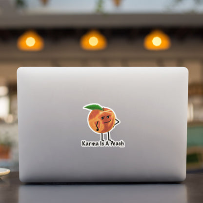 Karma Is a Peach funny peach sticker on a laptop