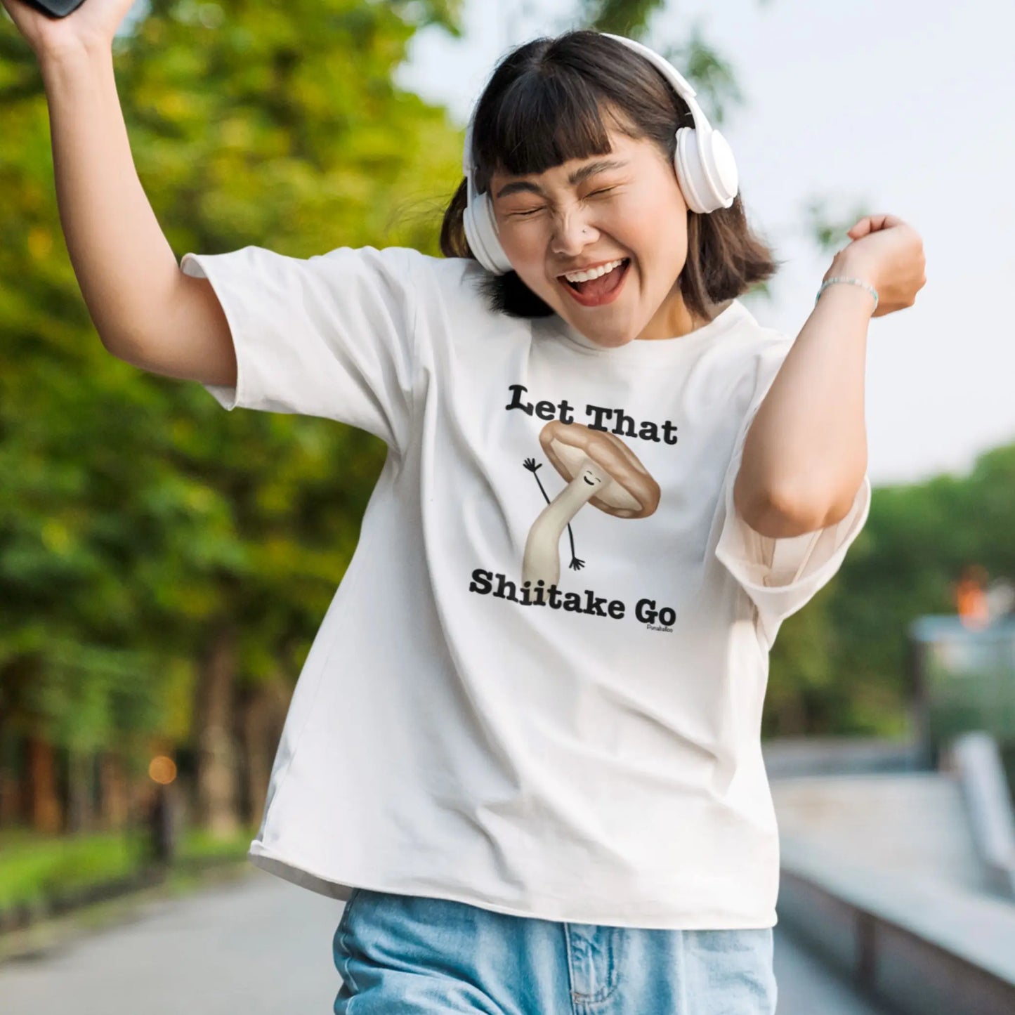 Let That Shiitake Go Funny Mushroom Pun T-Shirt Styled on a model