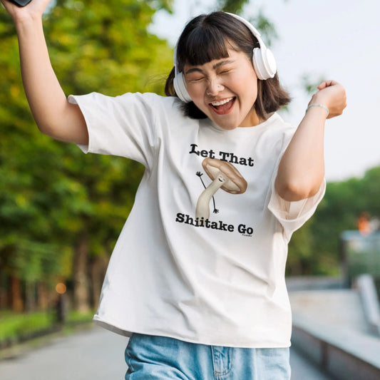 Let That Shiitake Go Funny Mushroom Pun T-Shirt Styled on a model