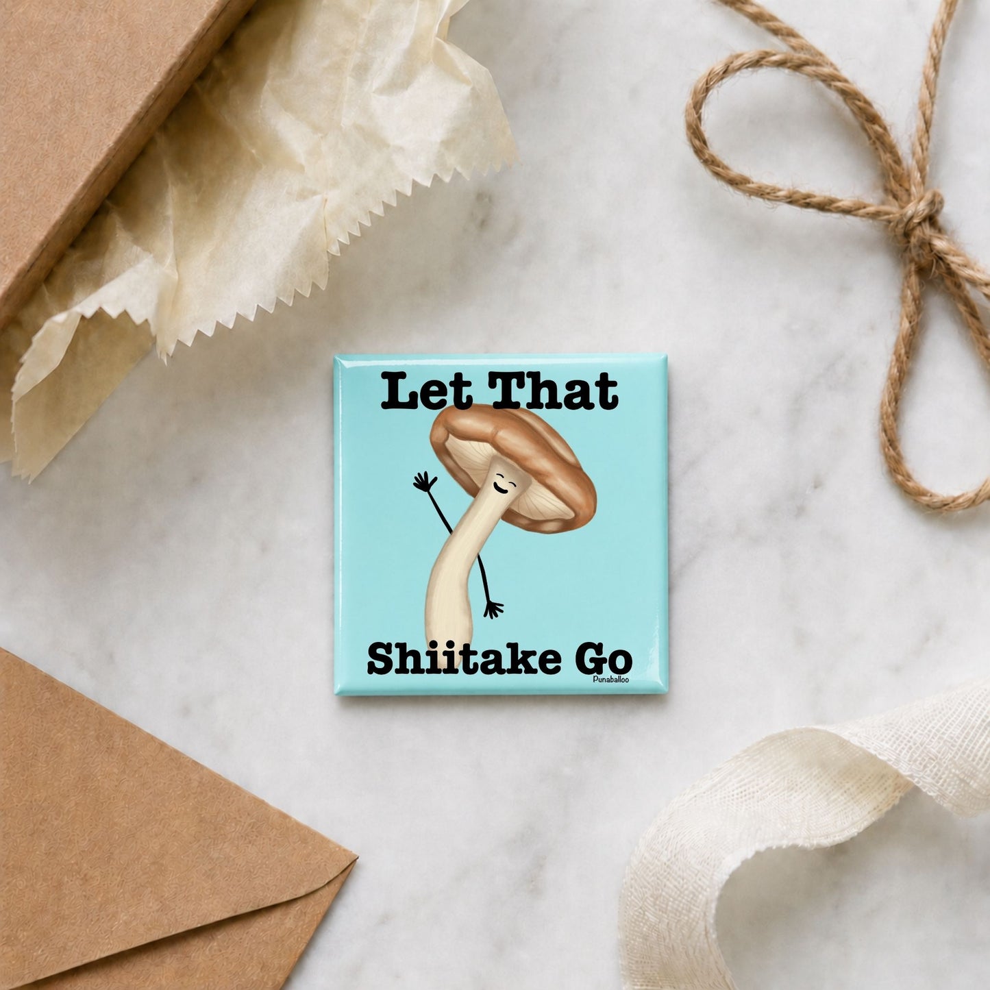 Let That Shiitake Go funny mushroom magnet in a gift flat lay