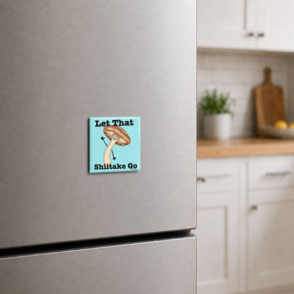 Let That Shiitake Go mushroom pun magnet on a kitchen fridge