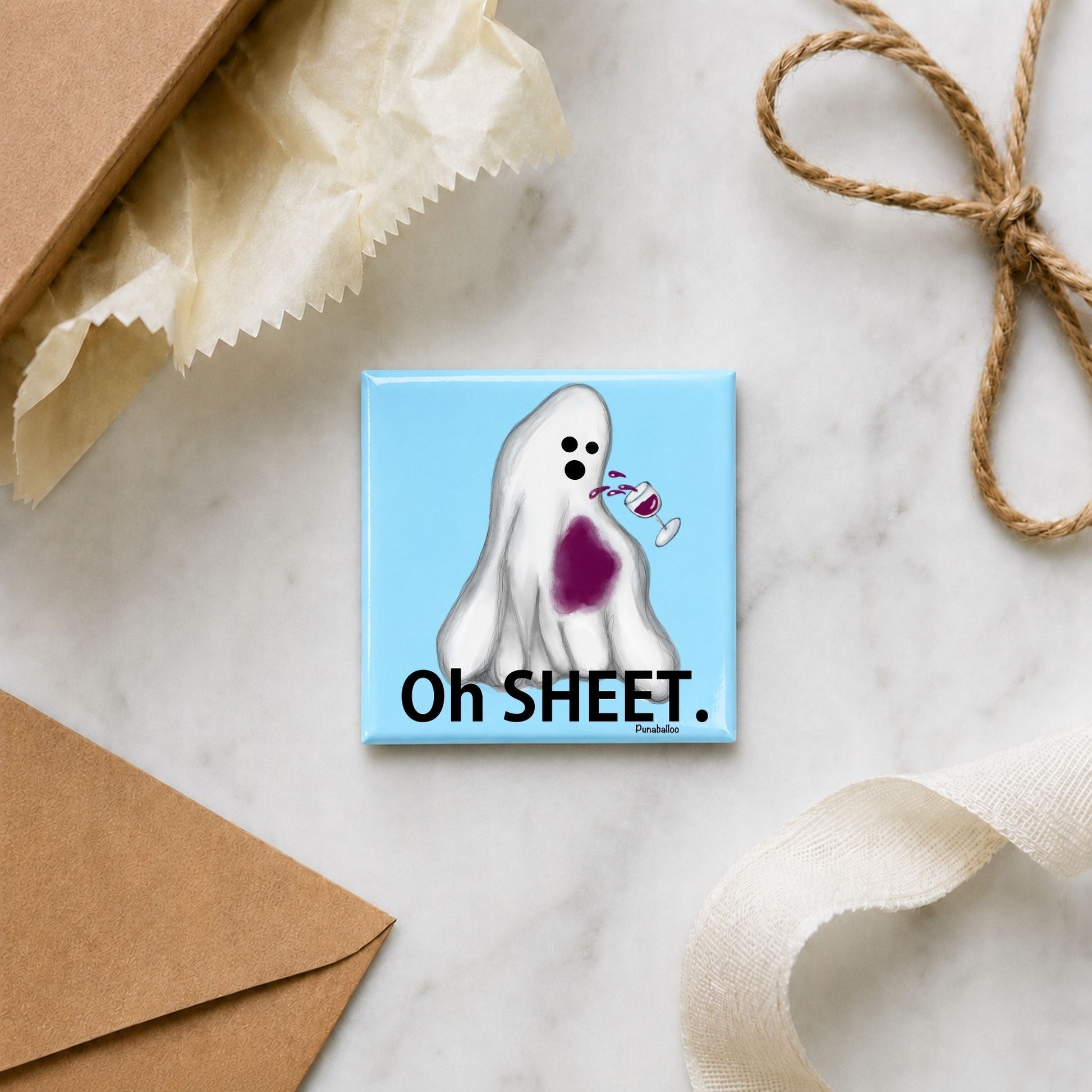 Oh Sheet ghost pun magnet in a gift flat lay