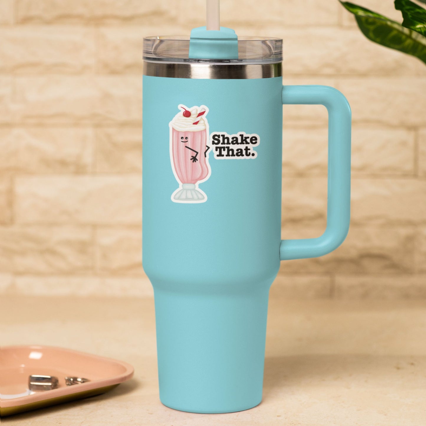 Shake That funny milkshake sticker on a blue travel tumbler