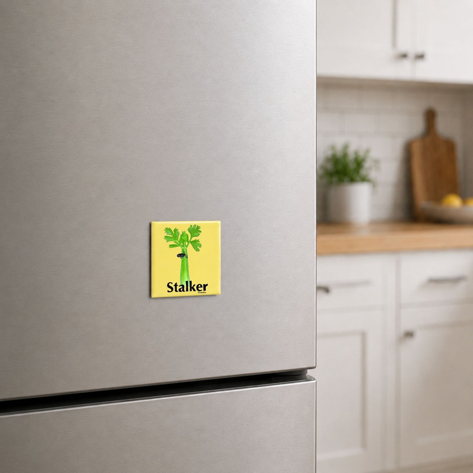 Stalker celery pun magnet on a kitchen fridge