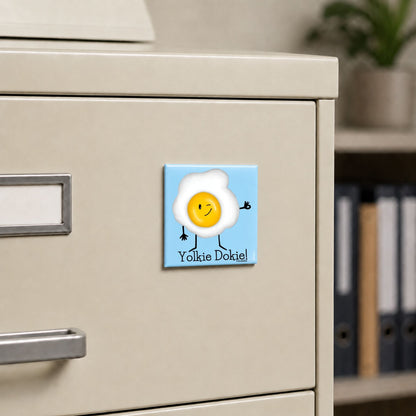 Yolkie Dokie egg pun magnet on a cream file cabinet