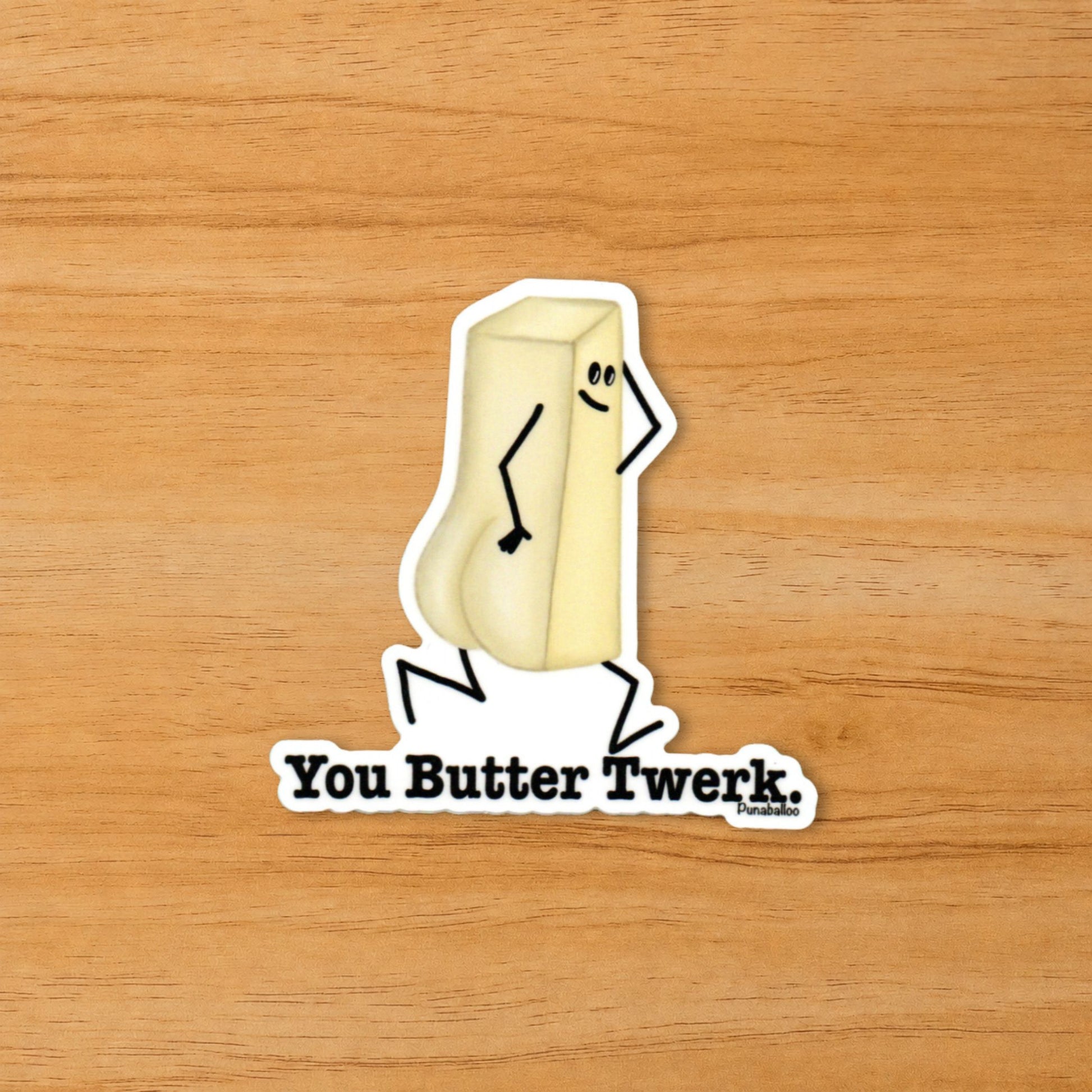You Butter Twerk funny butter sticker on a wood surface