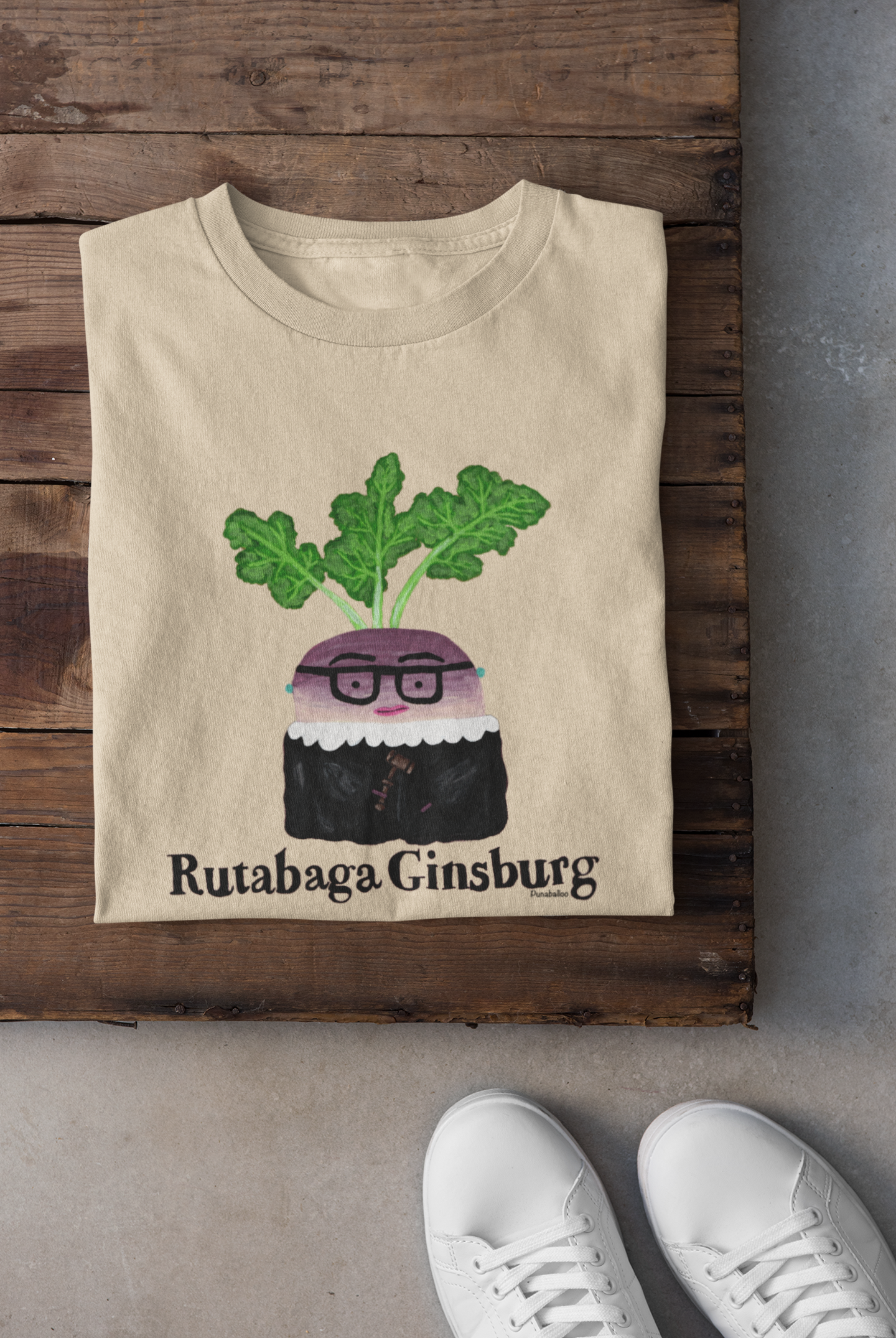 Soft Cream colored Rutabaga Ginsburg t-shirt folded with sneakers