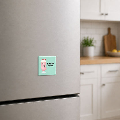 Milkshake pun magnet on a stainless steel refrigerator in a bright kitchen