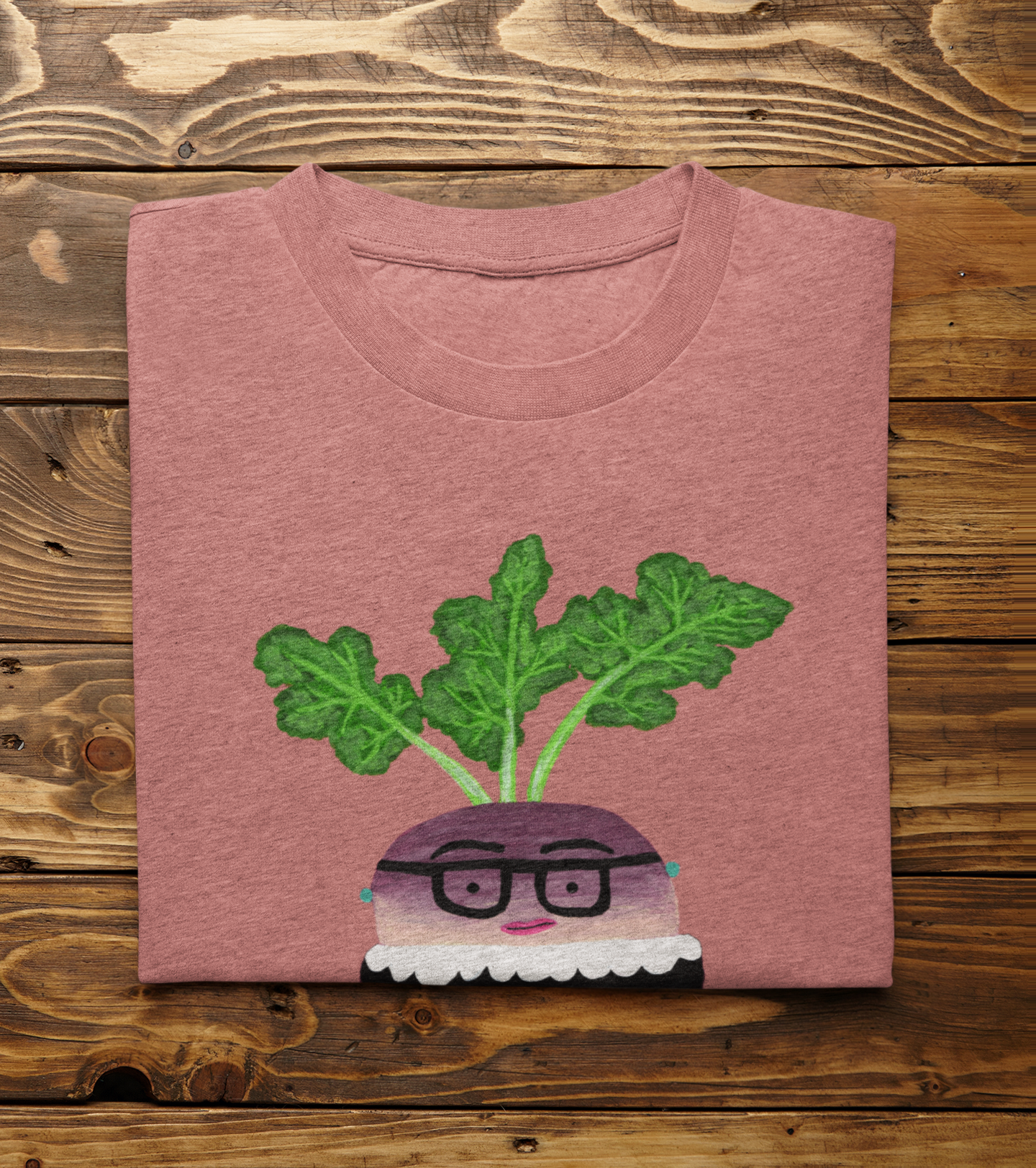 Heather Mauve Mauve Rutabaga Ginsburg pun shirt folded on wood background