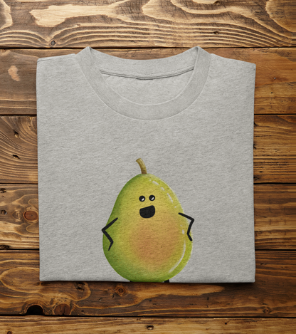 A folded light gray t-shirt with a cute cartoon pear graphic, displayed flat on a rustic wooden plank background.
