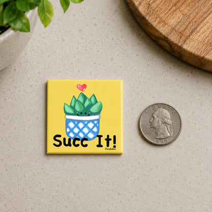 Succ It succulent magnet shown beside a quarter for scale