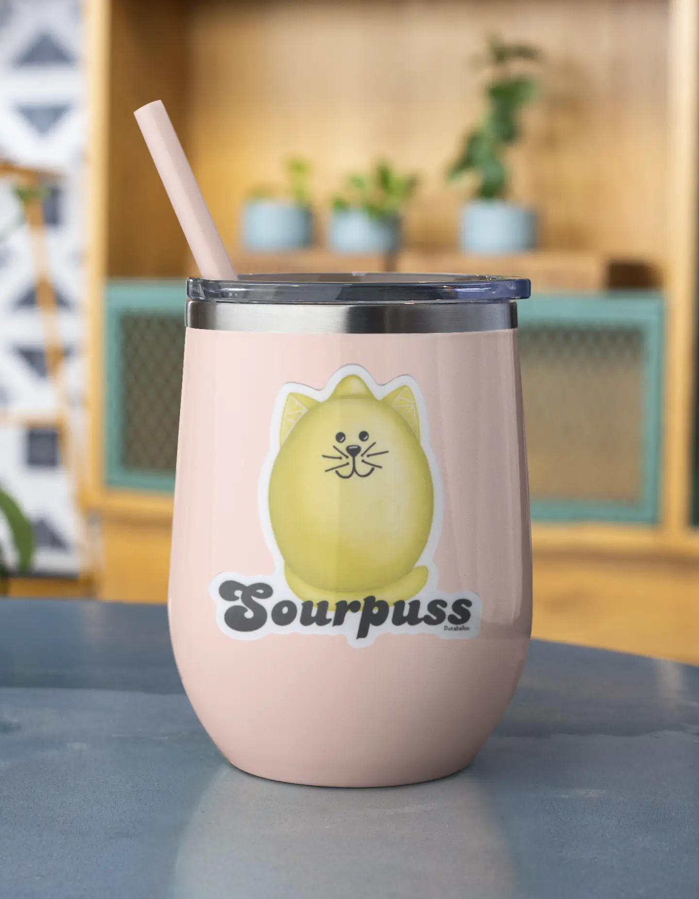Pink wine tumbler with Sourpuss pun sticker featuring a lemon & cat design
