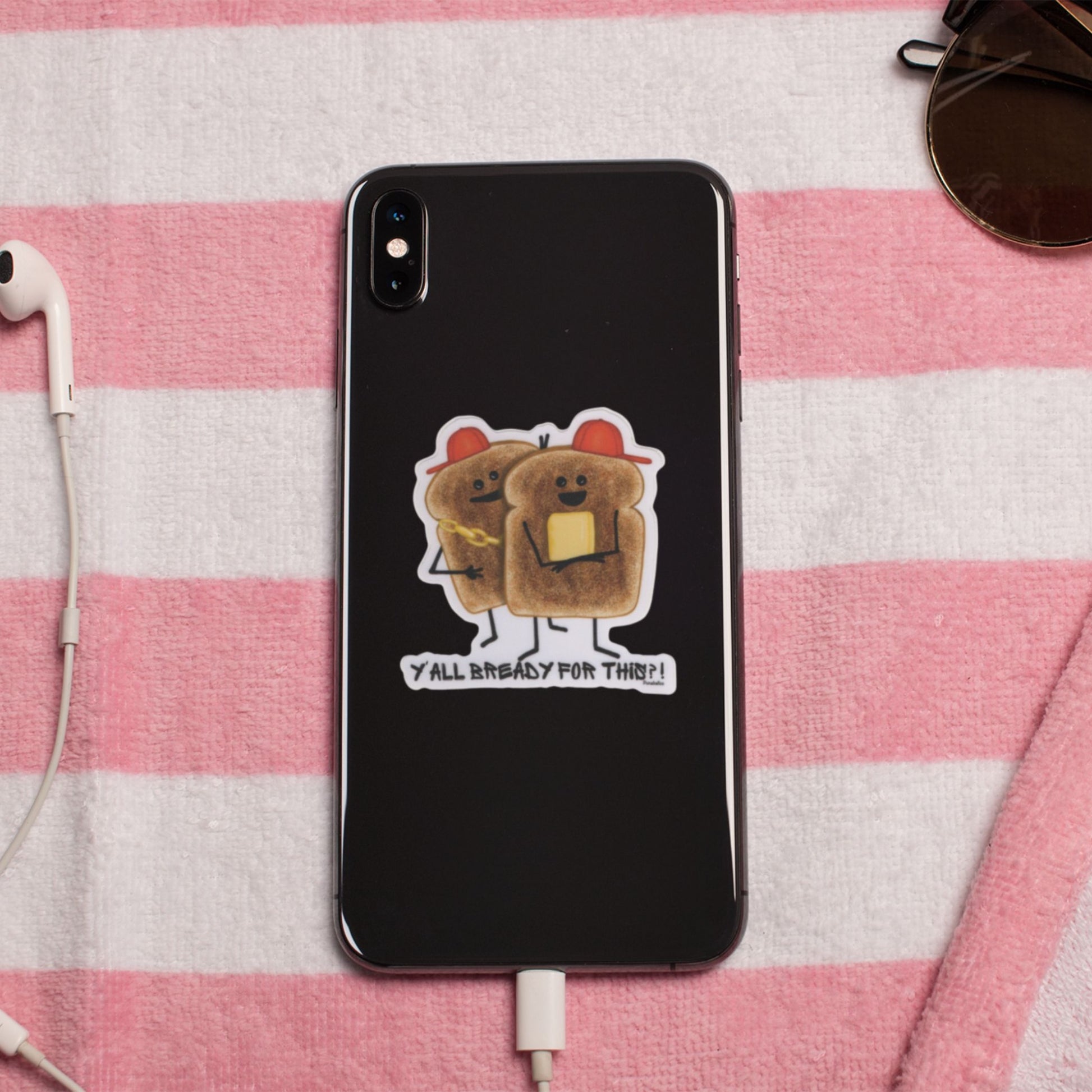 Y’all Bready bread sticker displayed on a black phone