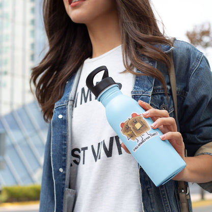 Woman holding a blue water bottle with a Y’all Bready bread sticker