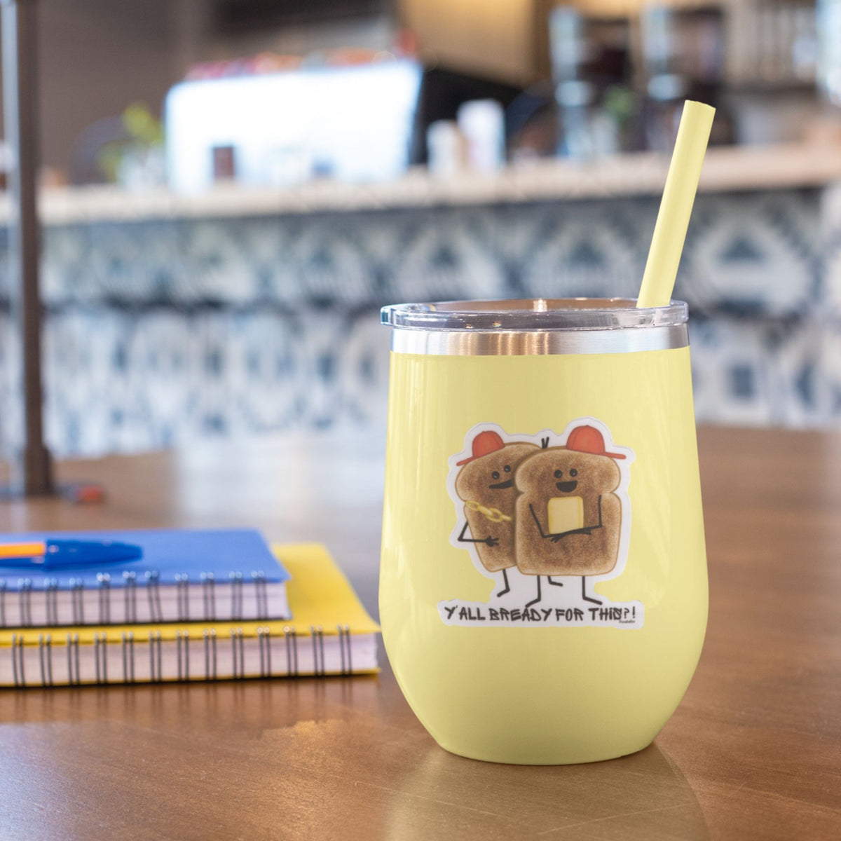 Funny bread sticker displayed on a yellow insulated tumbler